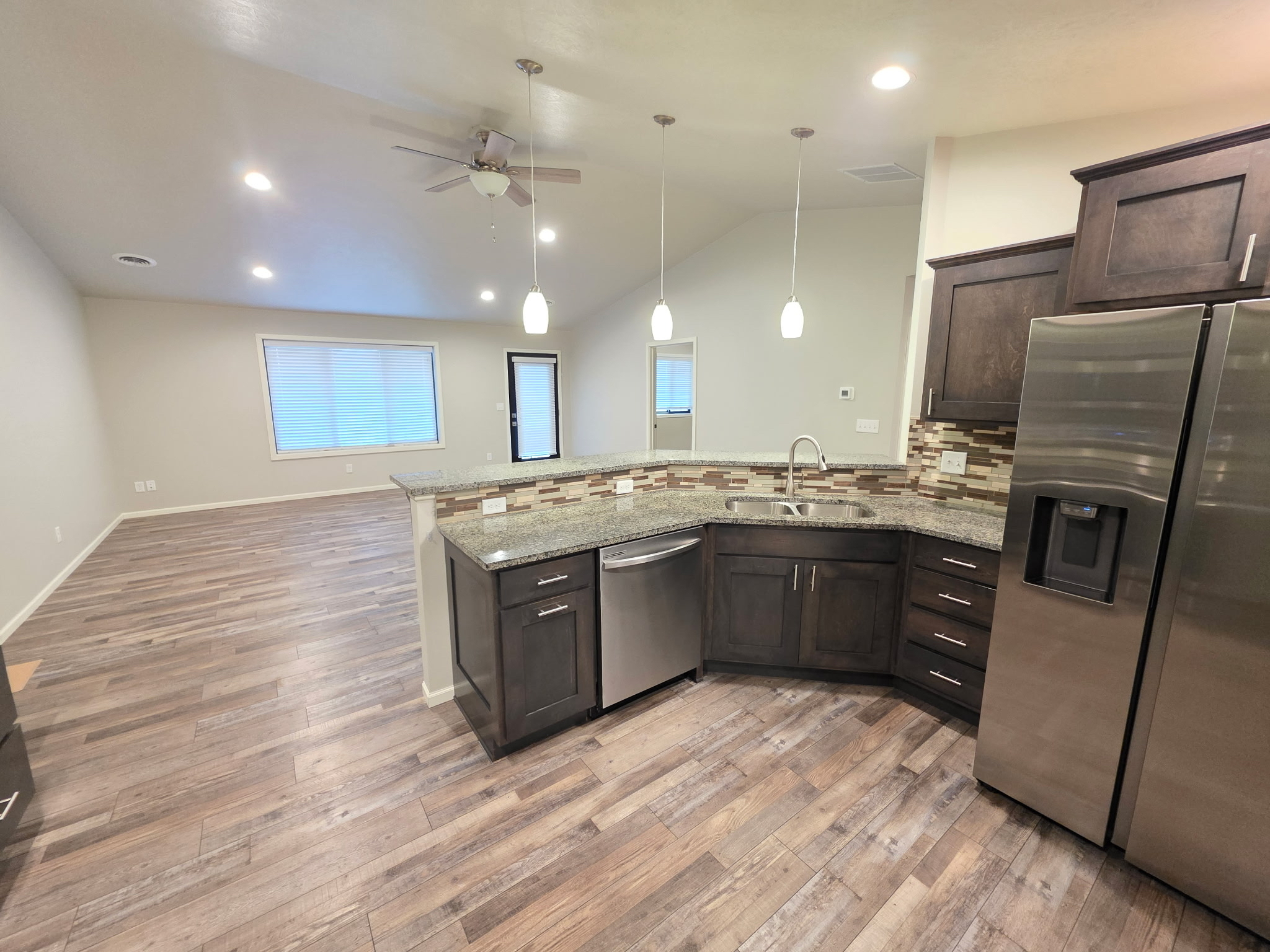 Bright kitchen and living area inside a managed rental property